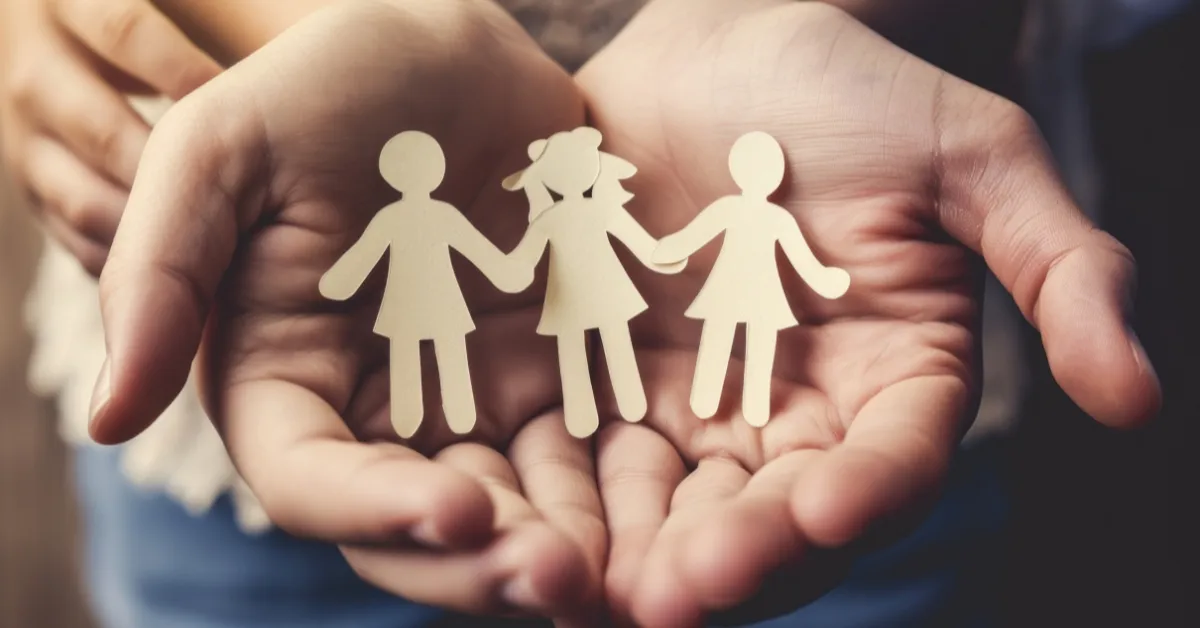 Holding hands symbolizes the strength and importance of family support.